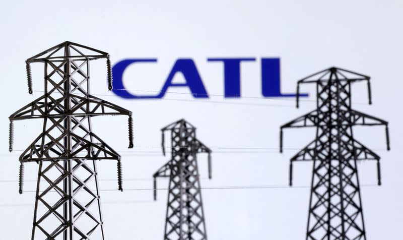 FILE PHOTO: Illustration shows Electric power transmission pylon miniatures and CATL logo