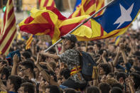 <p>Students demonstrate against the position of the Spanish government to ban the Self-determination referendum of Catalonia during a university students strike on Sept. 28, 2017 in Barcelona, Spain. The Catalan goverment is keeping with its plan to hold a referendum, due to take place on October 1, which has been deemed illegal by the Spanish government in Madrid. (Photo: Dan Kitwood/Getty Images) </p>