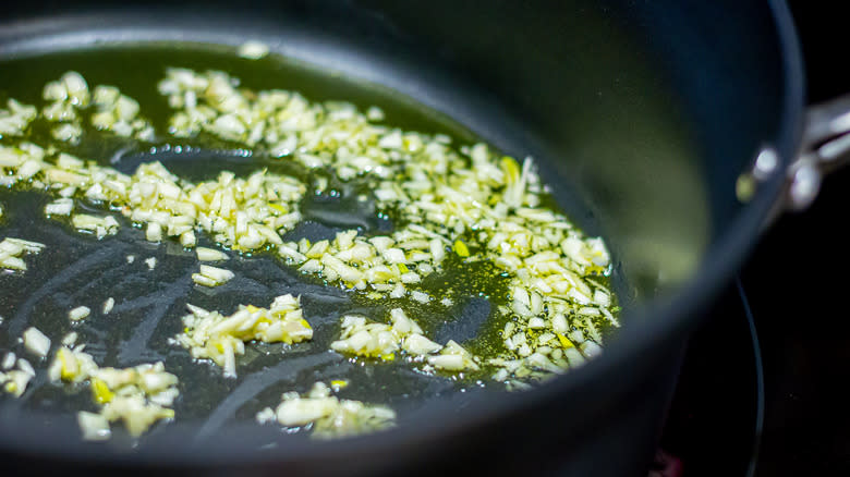 garlic cooking in pot