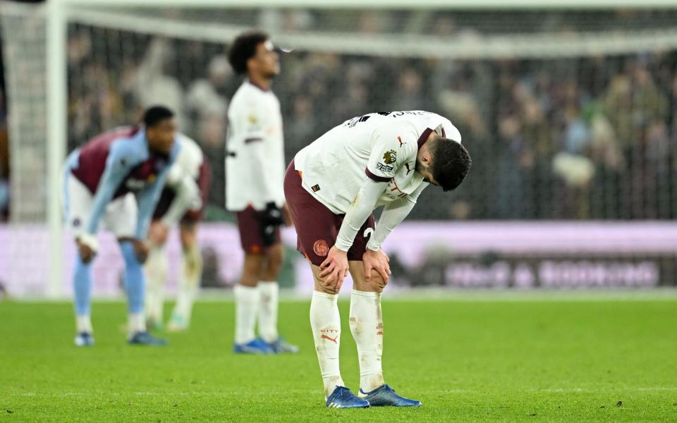 Josko Gvardiol of Manchester City looks dejected at full-time after the team's defeat in the Premier League match between Aston Villa and Manchester City at Villa Park on December 06, 2023 in Birmingham, England