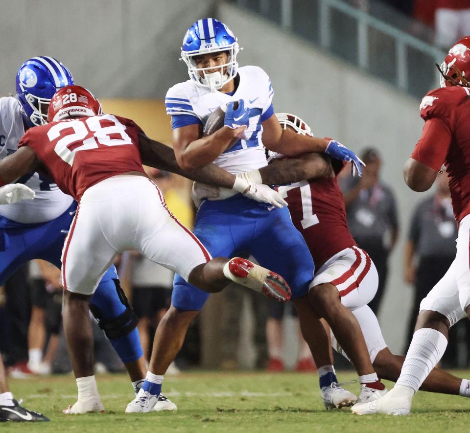 Brigham Young Cougars running back LJ Martin (27) runs against the Arkansas Razorbacks at Razorback Stadium in Fayetteville on Saturday, Sept. 16, 2023. BYU won 38-31. | Jeffrey D. Allred, Deseret News