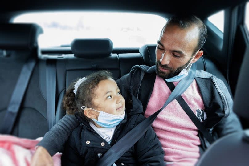 A Palestinian father and daughter are driven to a medical appointment in Israel