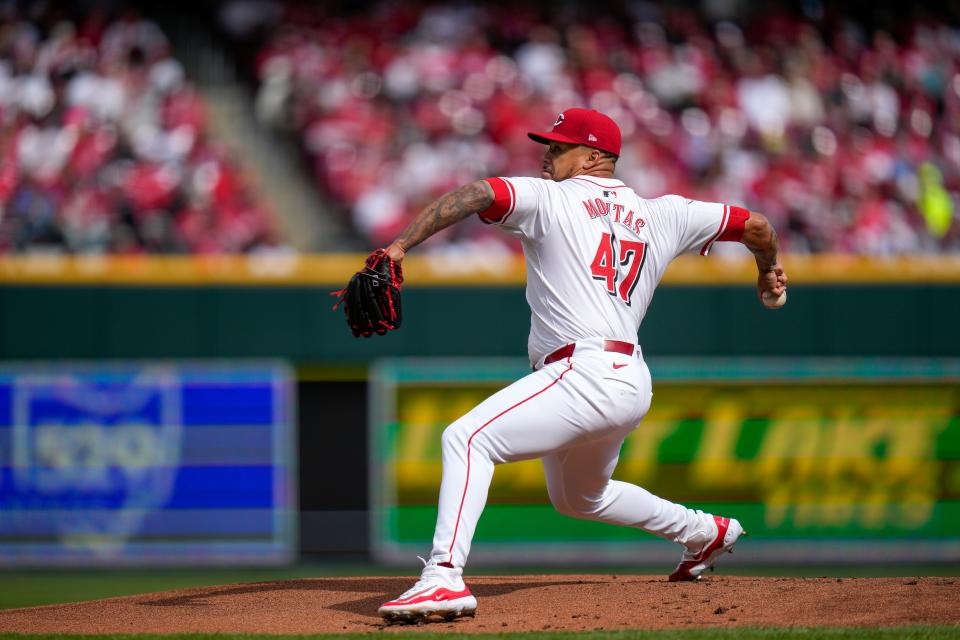 Cincinnati Reds starting pitcher Frankie Montas (47) throws the first pitch of the first inning of the MLB National League Opening Day game between the Cincinnati Reds and the Washington Nationals at Great American Ball Park in downtown Cincinnati on Thursday, March 28, 2024.