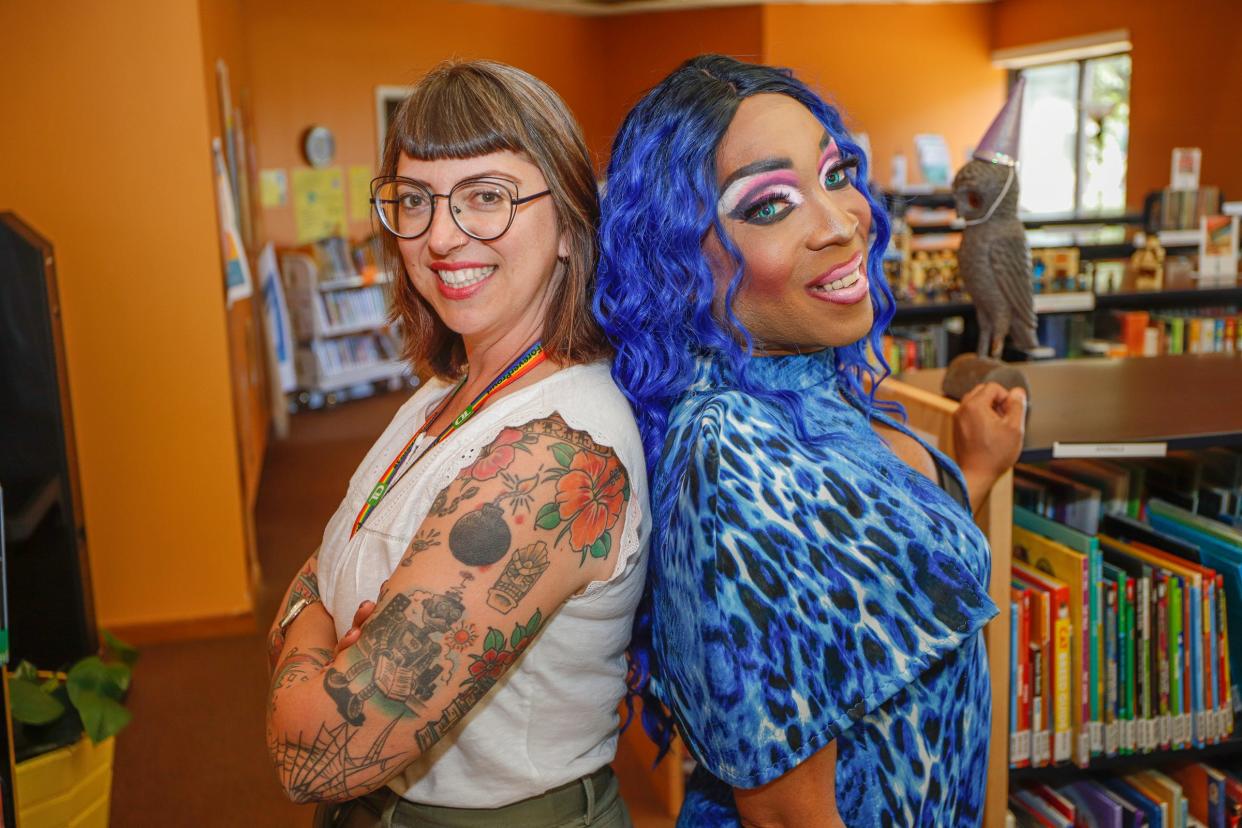 Portrait of Librarian Joyce Krom, 48, of Huntington Woods and Raven Divine Cassadine at the Mount Clemens library on Thursday, June 23, 2022.