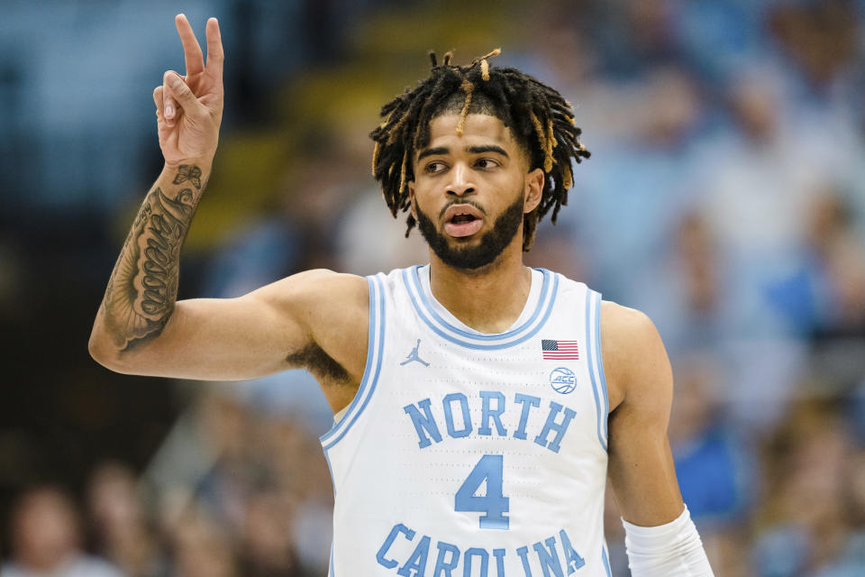 North Carolina guard R.J. Davis (4) directs a play in the first half of an NCAA college basketball game against Notre Dame on Saturday, Jan. 7, 2023, in Chapel Hill, N.C. (AP Photo/Jacob Kupferman)