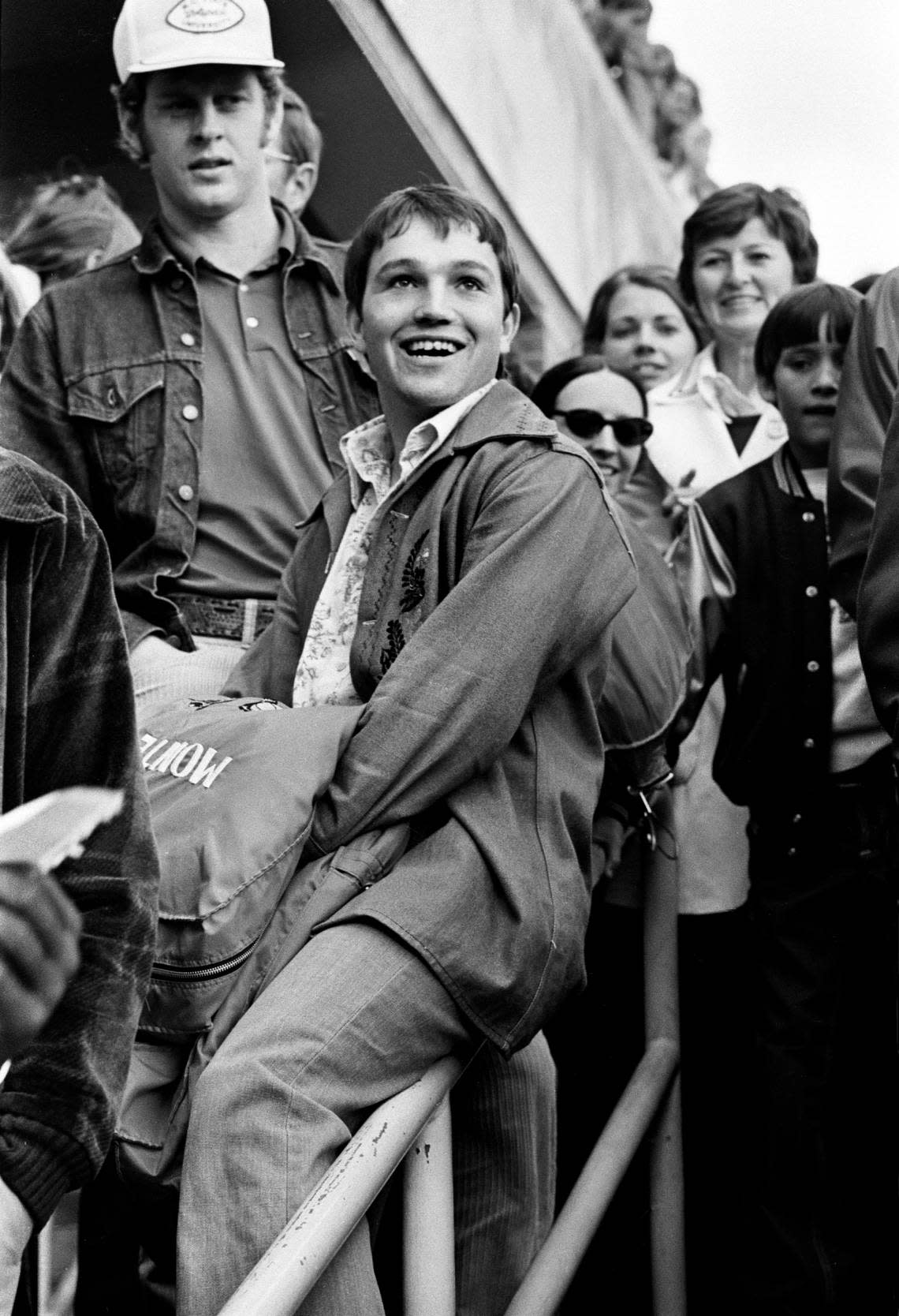 NC State point guard Monte Towe looks out at the crowd sending off the 1974 Wolfpack to the Final Four.