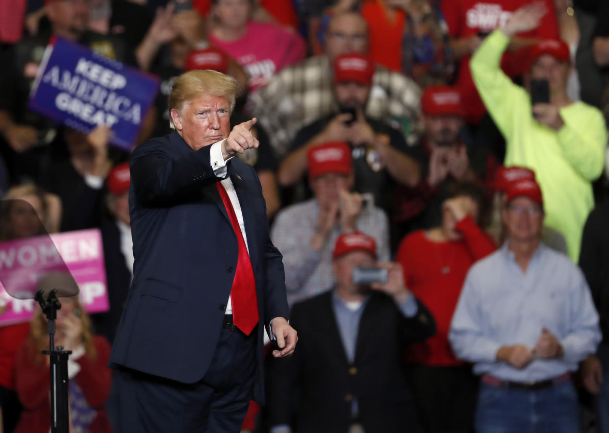President Trump leaves the stage at the end of a campaign rally at <span>Southeast Missouri State University, </span>in Cape Girardeau, Mo., on Nov. 5. (Photo: Jeff Roberson/AP)