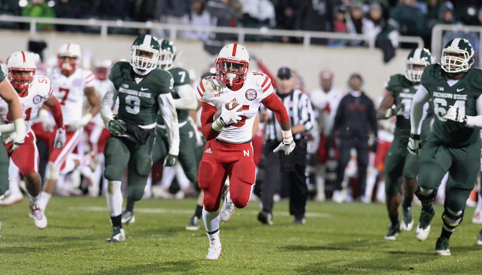 Nebraska's De'Mornay Pierson-El runs back a punt for a touchdown against Michigan State in the fourth quarter Oct. 4, 2014.