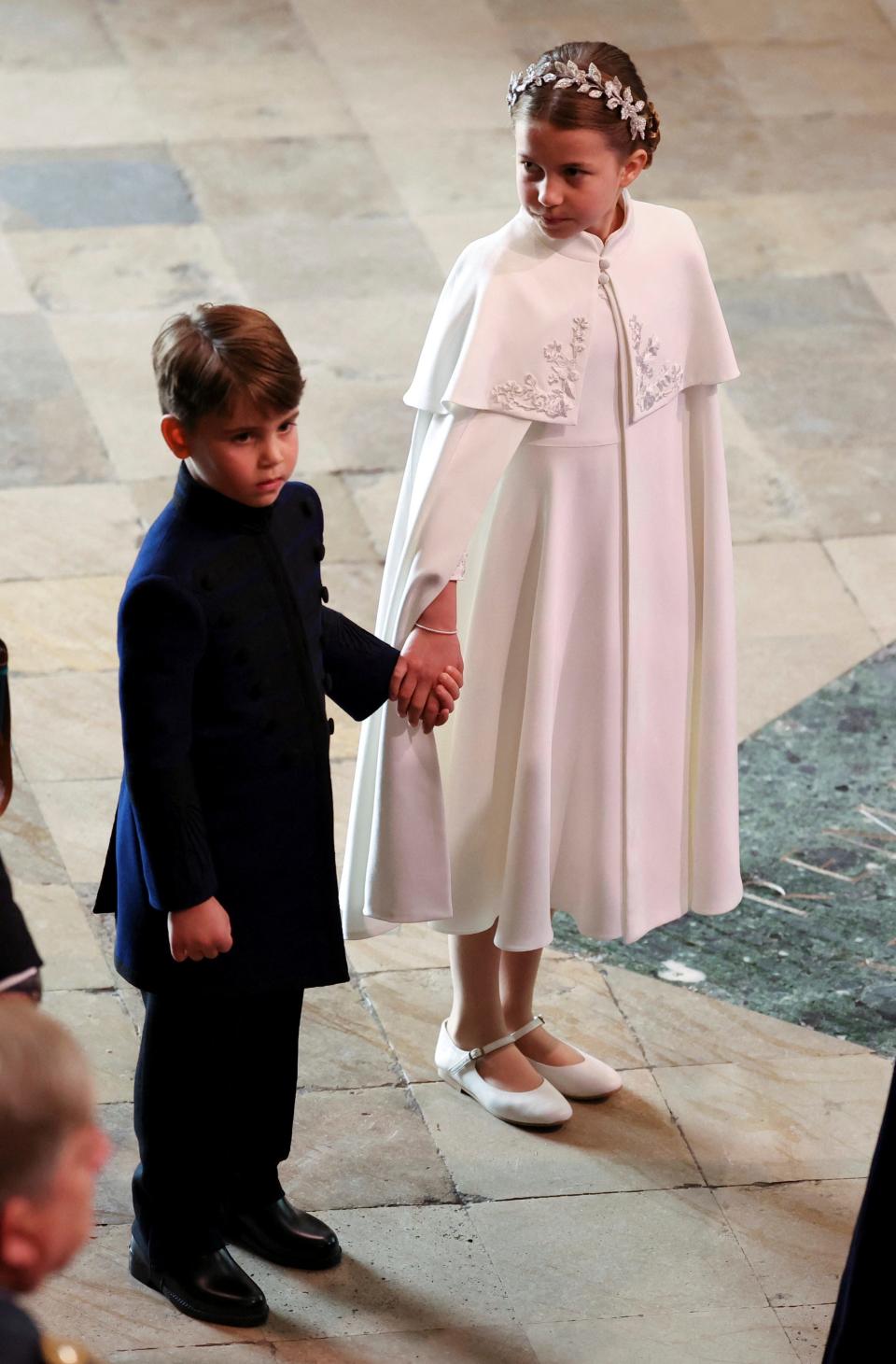 Britain's Prince George and Princess Charlotte arrive at the coronation of King Charles III at Westminster Abbey, London, Saturday, May 6, 2023.