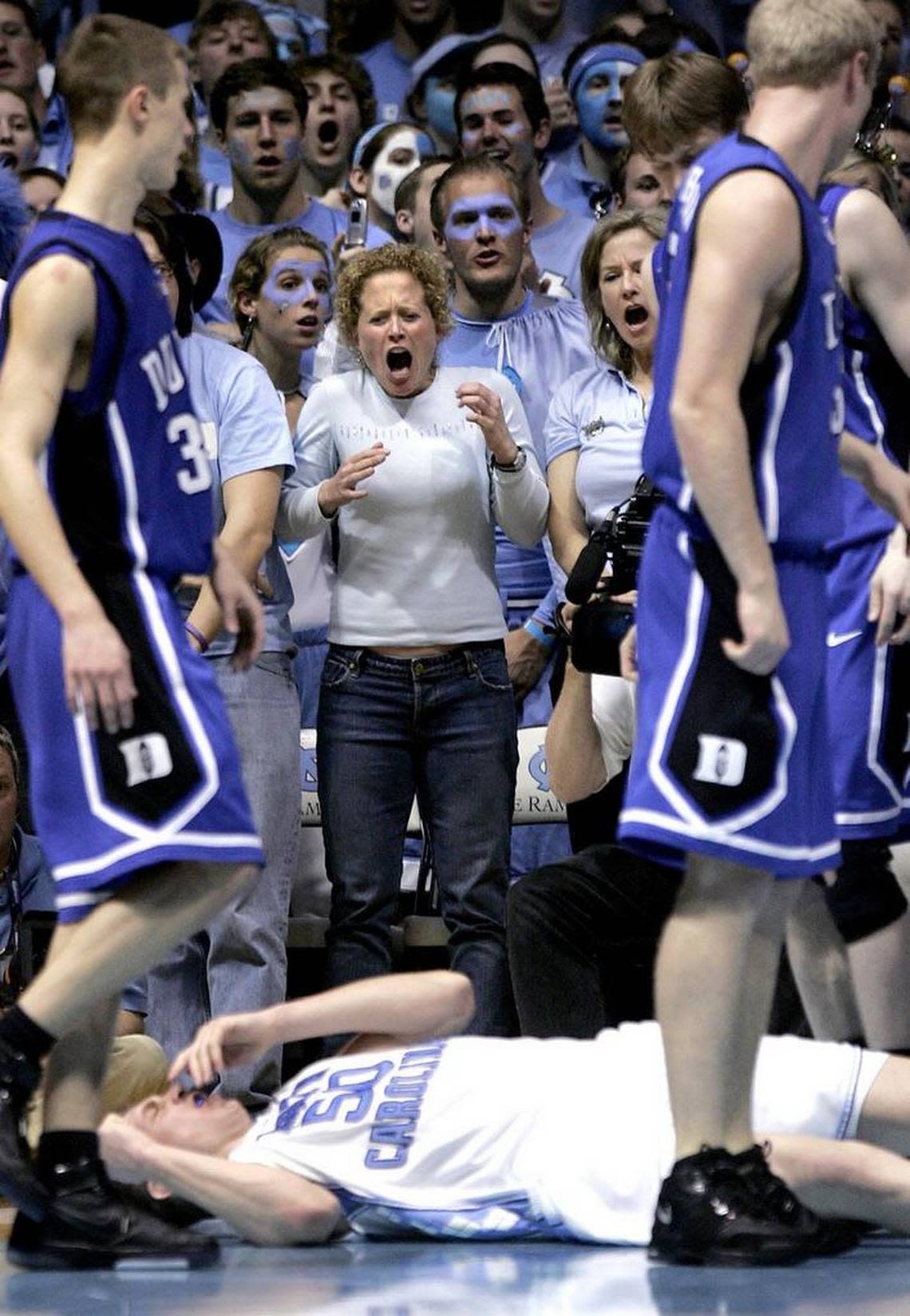 UNC fans react after a flagrant foul by Duke’s Gerald Henderson (not pictured) knocked down UNC’s Tyler Hansbrough late during UNC’s 86-72 win over Duke on March 4, 2007.