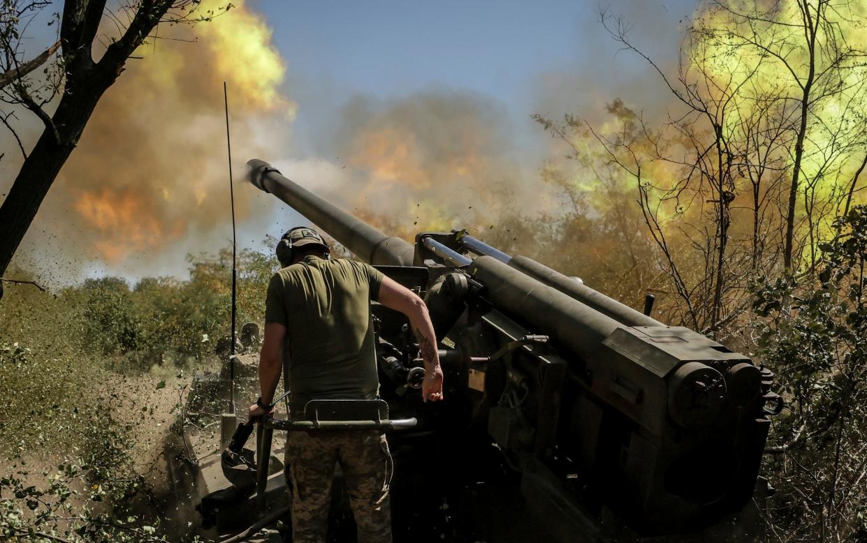 Servicemen of the 24th Mechanised Brigade fire a "Giatsint-S" towards Russian positions near Chasiv Yar town, in Donetsk region, Ukraine