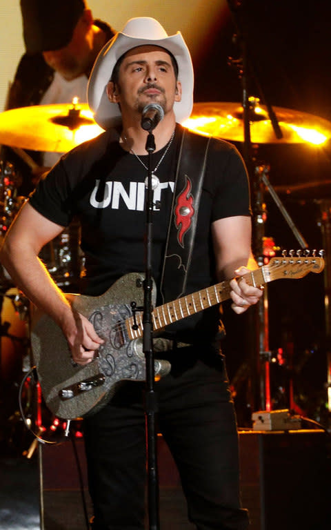 Brad Paisley performs during the 51st annual CMA Awards - Credit: Taylor Hill