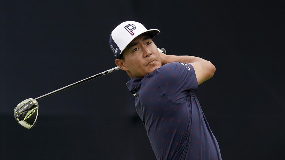 FILE - Justin Suh plays his shot from the seventh tee during the second round of the U.S. Open Golf Championship, Friday, June 18, 2021, at Torrey Pines Golf Course in San Diego. Three years after his All-American career at USC, Suh has a PGA Tour card for next season. (AP Photo/Gregory Bull, File)