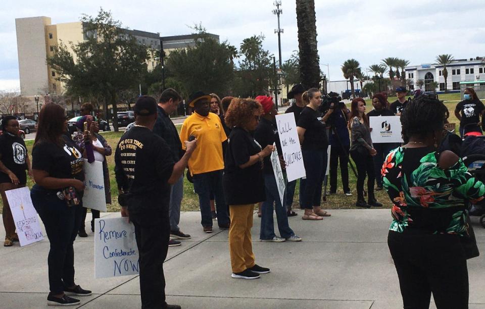 About 50 people including community activists demonstrated outside the Duval County Courthouse on Sunday to demand police reform in Jacksonville as well as nationwide following the death of Tyre Nichols who was beaten by at least five Memphis police officers who have been fired and charged with murder in his death.