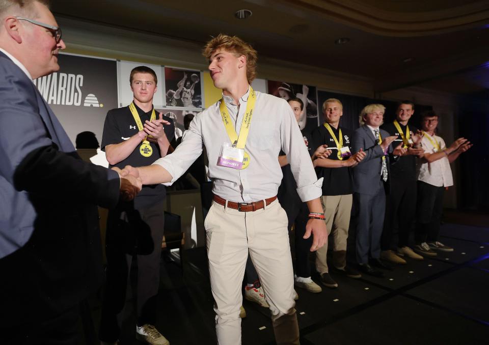 Park City’s Chase Beyer is awarded lacrosse player of the year by Deseret News executive editor Doug Wilks during the Deseret News high school sports awards at Little America in Salt Lake City on Saturday, June 10, 2023. | Jeffrey D. Allred, Deseret News