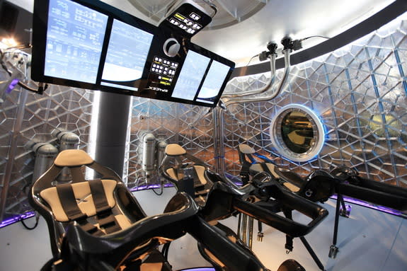 The inside of SpaceX's Dragon V2, designed to take seven crewmembers to space.