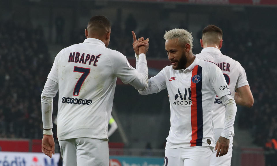 Neymar (right), Kylian Mbappe and Paris Saint-Germain were awarded the French title two days after the Ligue 1 season was cancelled because of the coronavirus. (Franck Fife/Getty)