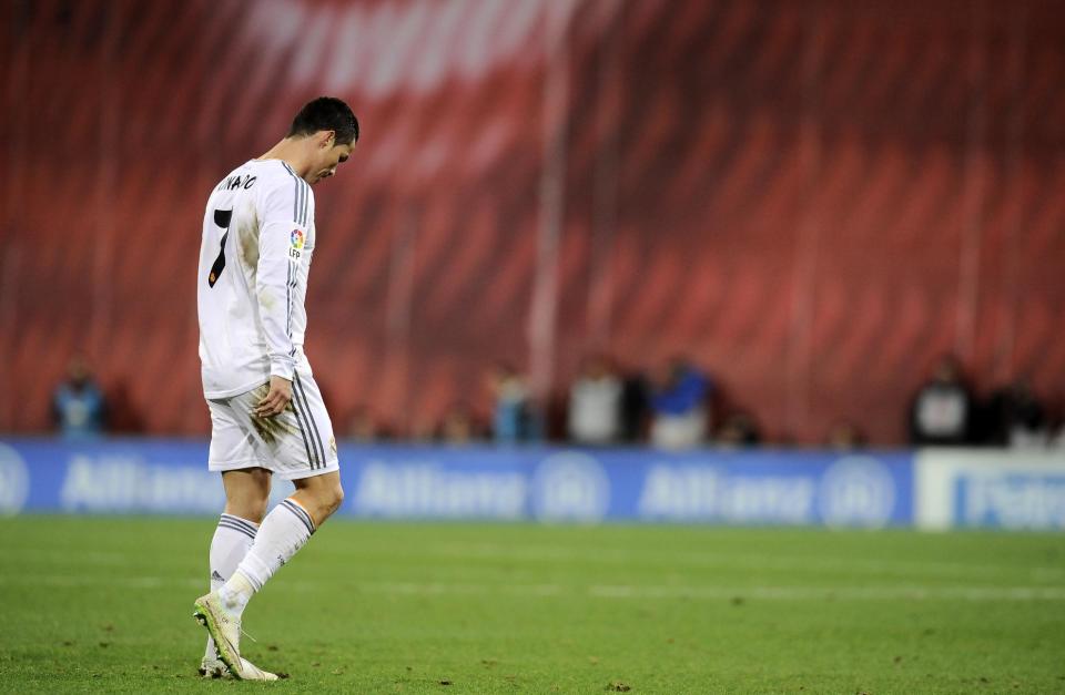 Real Madrid's Cristiano Ronaldo of Portugal, leaves the pitch after receiving a direct red card, during their Spanish League soccer match against Athletic Bilbao, at San Mames stadium in Bilbao, Spain, Sunday, Feb. 2, 2014. (AP Photo/Alvaro Barrientos)