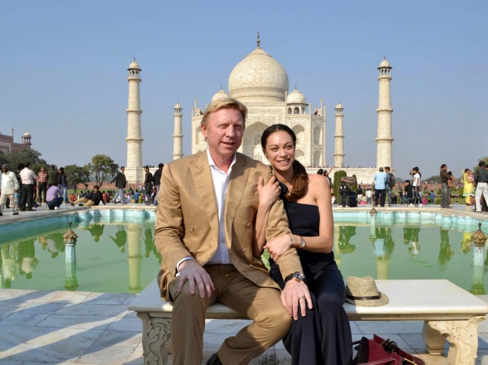 Former tennis star Boris Becker and his wife Lilly pose for a photograph in front of the Taj Mahal  in 2012 (Pawan Sharma/AP)