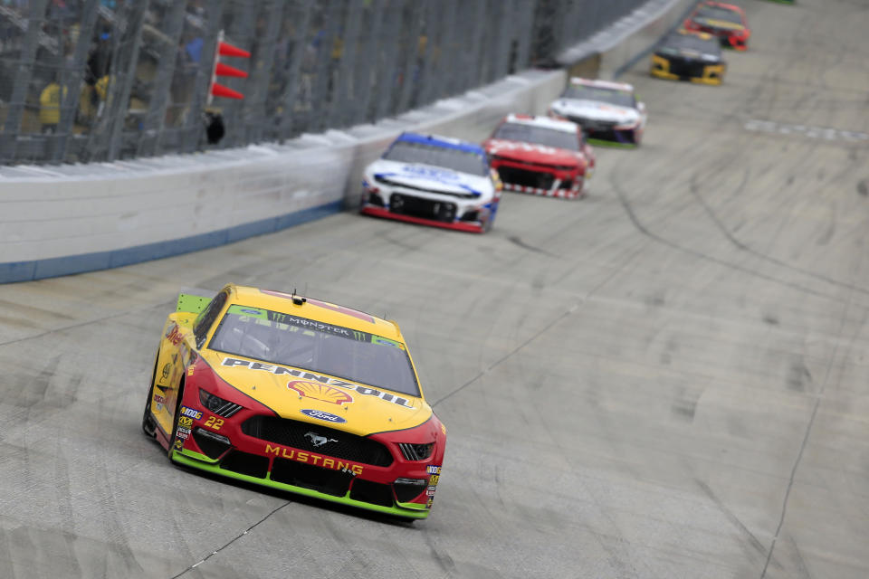 DOVER, DELAWARE - OCTOBER 06: Joey Logano, driver of the #22 Shell Pennzoil Ford, leads a pack of cars during the Monster Energy NASCAR Cup Series Drydene 400 at Dover International Speedway on October 06, 2019 in Dover, Delaware. (Photo by Chris Trotman/Getty Images)