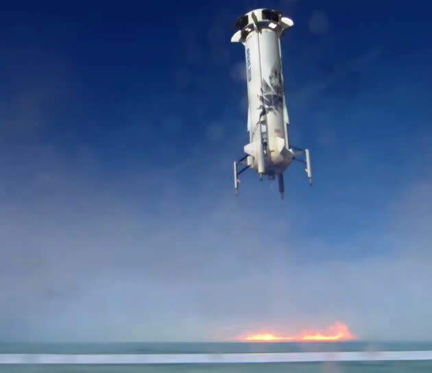 Blue Origin’s New Shepard booster comes in for a landing. (Blue Origin via YouTube)