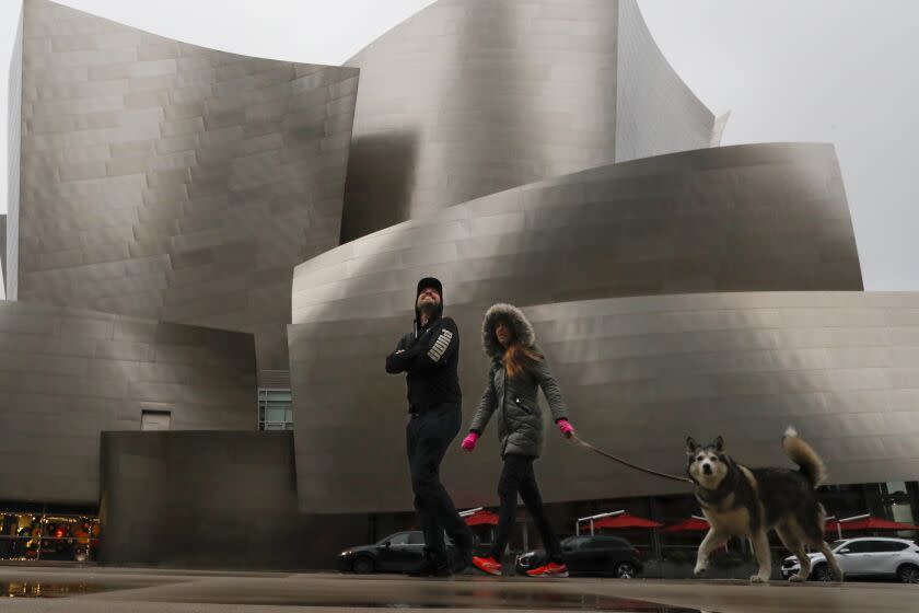 Los Angeles, CA, Saturday, December 31, 2022 - Rain soaks the downtown area near the Broad Museum and Grand Park. (Robert Gauthier/Los Angeles Times)
