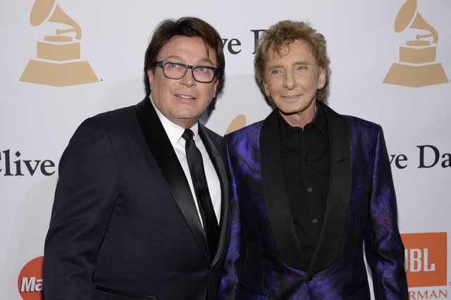 <p>Kevork Djansezian/Getty</p> Barry Manilow with husband Garry Kief