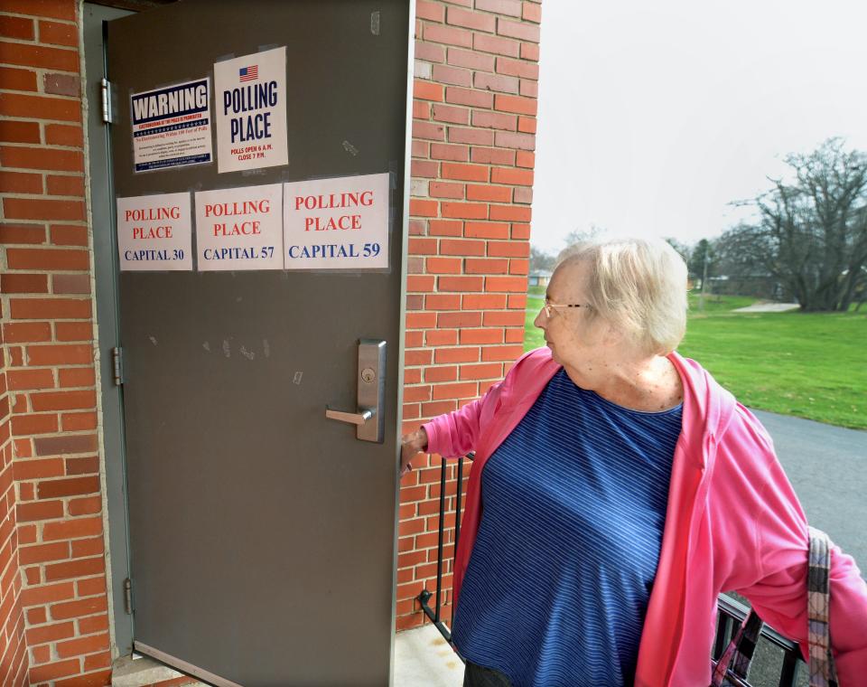 Freida Greene leaves the Knights of Columbus building on West Street after voting on election day Tuesday, April 4, 2023.