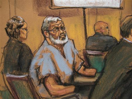 Abu Hamza al-Masri, the radical Islamist cleric facing U.S. terrorism charges, sits with his legal team in Manhattan federal court in New York in this artist's sketch, April 14, 2014. REUTERS/Jane Rosenberg