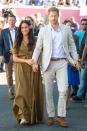 <p>Walking with their hands intwined together, the Duke and Duchess of Sussex greeted onlookers as they attended the Heritage Day public holiday celebrations in the Bo Kaap district of Cape Town on 24 September. </p>