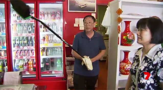 Mr Vuong armed himself with a broom. Picture: 7 News