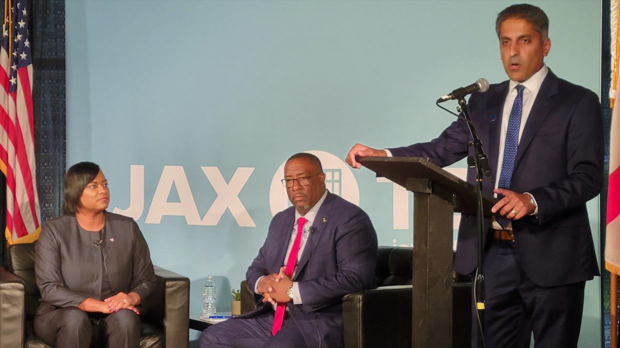 Democrat Lakesha Burton (left) and Republican T.K. Waters (center), candidates in Jacksonville's sheriff race, are introduced by Jacksonville Bar Association President Fraz Ahmed at Thursday's election forum co-hosted by Jacksonville Today.