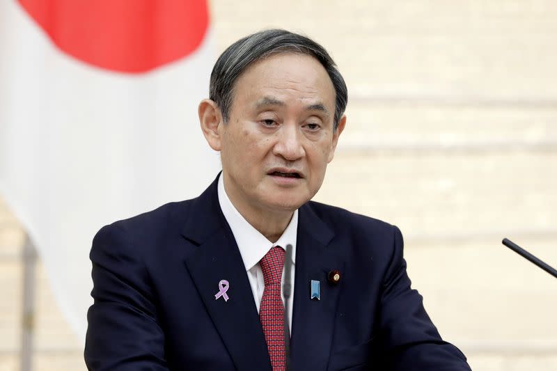 FILE PHOTO: Yoshihide Suga, Japan's prime minister, speaks during a news conference in Tokyo