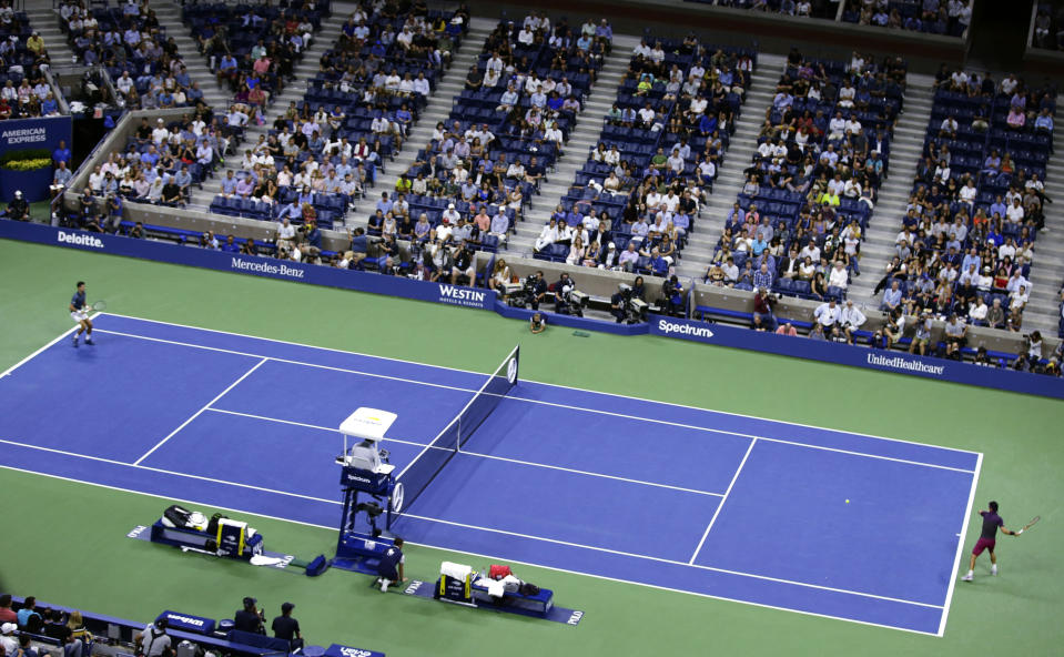 Kei Nishikori, right, of Japan, returns a shot to Novak Djokovic, of Serbia, during the semifinals of the U.S. Open tennis tournament, Friday, Sept. 7, 2018, in New York. (AP Photo/Frank Franklin II)