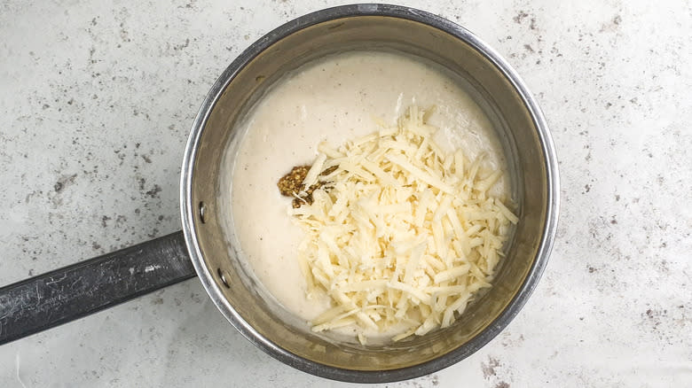 Cheese and mustard in bechamel sauce