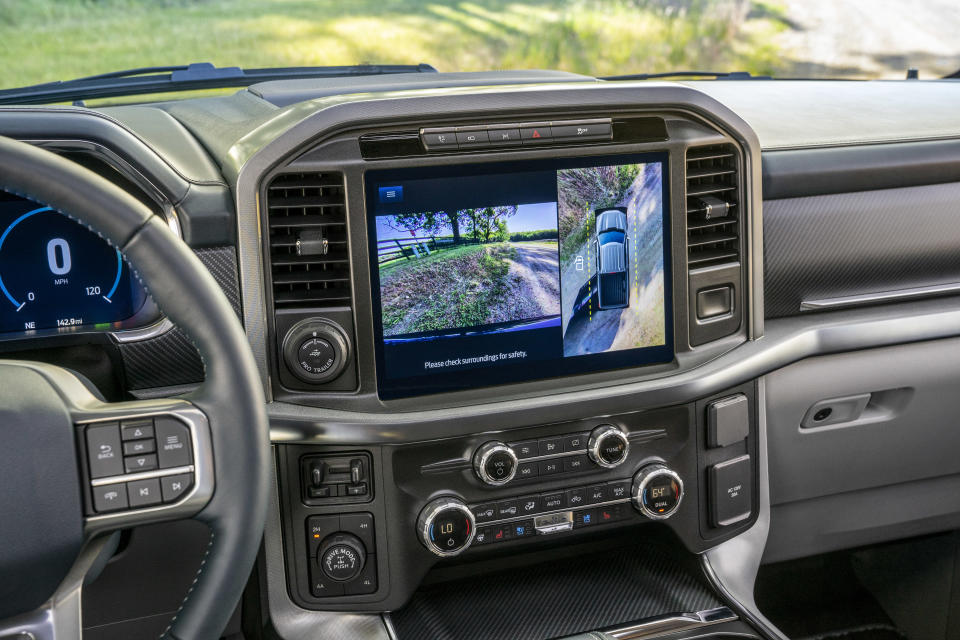 Available 12-inch center screen utilizes Þve high-resolution cameras to provide multiple views including a 360-degree overhead view to make maneuvering in tight spaces easy.