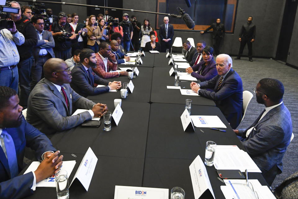 Former Vice President and 2020 Democratic presidential candidate Joe Biden, second from right, visits with an assembly of Southern black mayors Thursday, Nov. 21, 2019 in Atlanta. (AP Photo/John Amis)