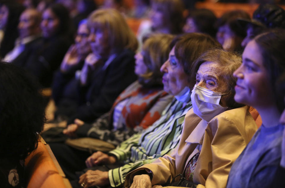 Dozens of Holocaust survivors sit together for a concert honoring their lives and celebrating the end of their pandemic isolation on Monday, June 14, 2021, at the Yeshivah of Flatbush theater at Joel Braverman High School in the Brooklyn borough of New York. (AP Photo/Jessie Wardarski)