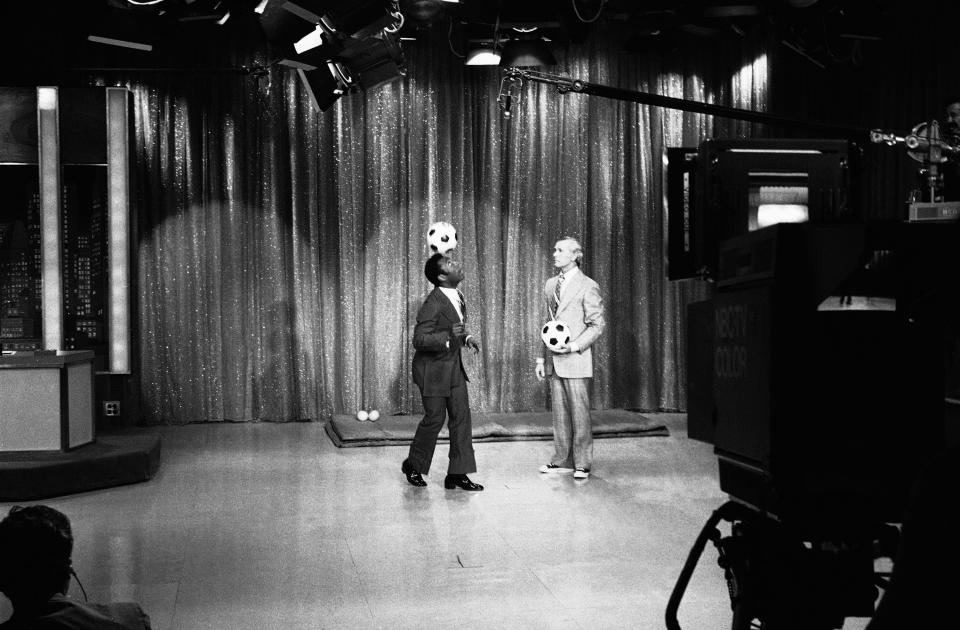 FILE - Pele gives a soccer demonstration during the taping of the Johnny Carson Show at NBC-TV studios in New York, May 9, 1973. Pelé, the Brazilian king of soccer who won a record three World Cups and became one of the most commanding sports figures of the last century, died in Sao Paulo on Thursday, Dec. 29, 2022. He was 82. (AP Photo, File)