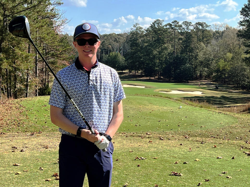 This photo shows Julian Peyton, 18, at Grand National Golf Course at Opelika, Alabama, on Nov. 10, 2022. Julian and his father, Matthew, took up golf during the pandemic. The sport turned into a passion for both. (Matthew Peyton via AP).