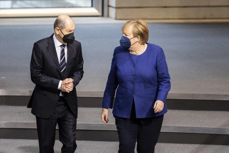 Olaf Scholz und Angela Merkel. (Bild: Florian Gaertner/Photothek via Getty Images)