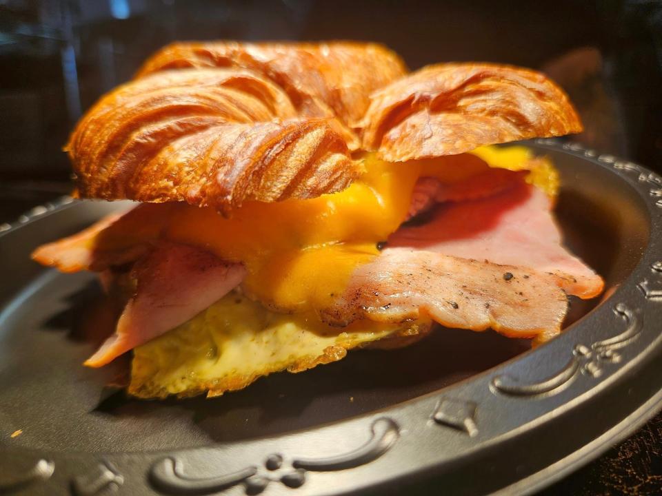 A Bourbon Ridge Smoked Ham, Egg and Tillamook Cheese Croissant at Breakfast AF in Louisville's Schnitzelburg neighborhood.