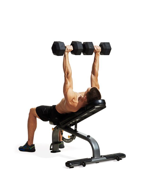 How to do it:<ol><li>Set an adjustable bench to a 30°-45° angle and lie back on it with a dumbbell in each hand at shoulder-level.</li><li>Press the weights over your chest.</li></ol>