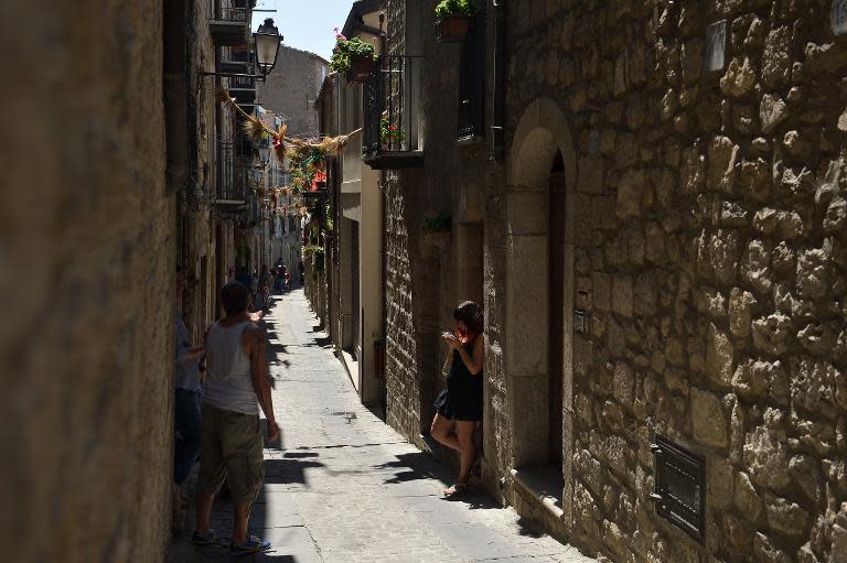 A narrow street is pictured in the historical centre of Gangi, Sicily, 120 kms from Palermo, on August 14, 2014