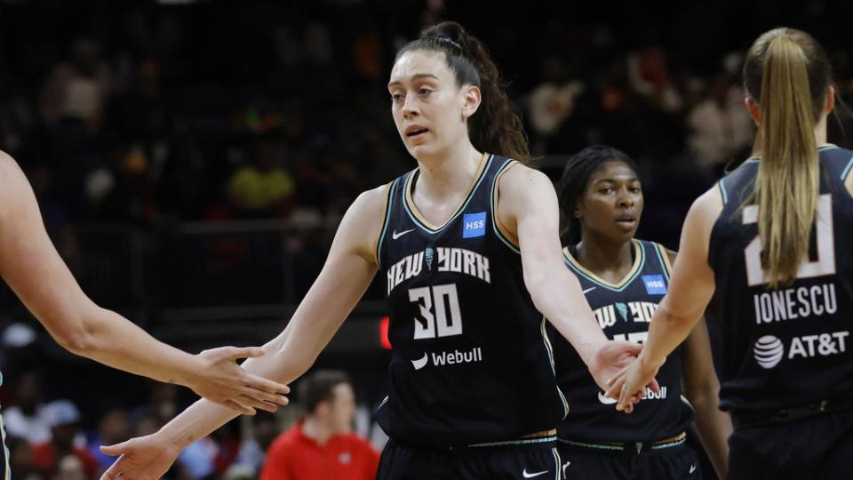 May 19, 2023; Washington, District of Columbia, USA; New York Liberty forward Breanna Stewart (30) encourages Liberty center Stefanie Dolson (31) and Liberty guard Sabrina Ionescu (20) against the Washington Mystics in the third quarter at Entertainment & Sports Arena.