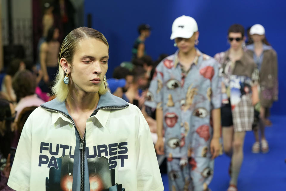 Models wear creations as part of the Dhruv Kapoor men's and women's Spring Summer 2024 collection, unveiled during the Fashion Week in Milan, Italy, Monday, June 19, 2023. (AP Photo/Antonio Calanni)