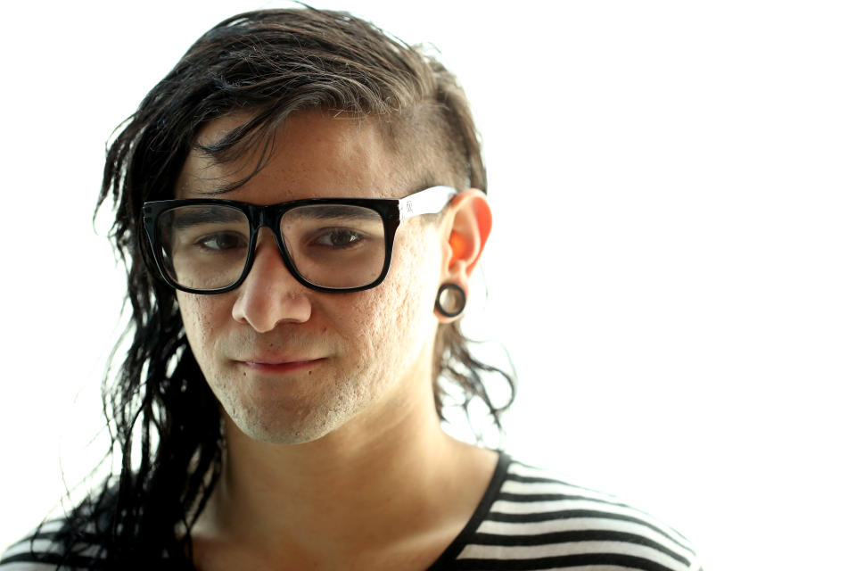 In this Thursday, March 6, 2014 photo, electronic music DJ and producer, Skrillex, whose real name is Sonny Moore, poses for a portrait in Los Angeles. The 26-year-old Grammy Award winner's first official album, "Recess," is out on Tuesday, March 18, 2014. It was recorded as he toured the world and unfettered by corporate rules. (Photo by Matt Sayles/Invision/AP)