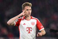 Bayern's Joshua Kimmich celebrates after scoring his side's opening goal during the Champions League quarter final second leg soccer match between Bayern Munich and Arsenal at the Allianz Arena in Munich, Germany, Wednesday, April 17, 2024. (AP Photo/Christian Bruna)