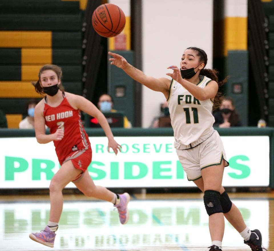 FDR's Maia Stewart passes the ball away from Red Hook's Katie Boyd during Wednesday's game in Staatsburg on January 26, 2022.
