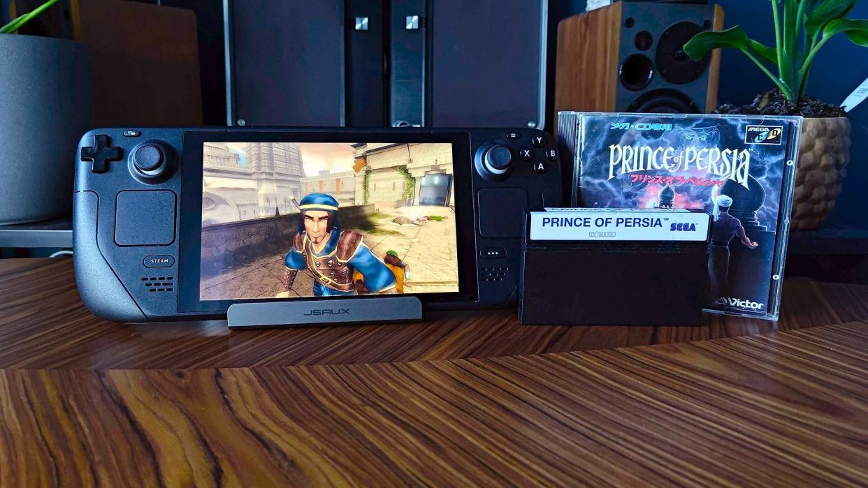  Prince of Persia: Sands of Time running on Steam Deck next to copies of original on Sega CD and Master System. 
